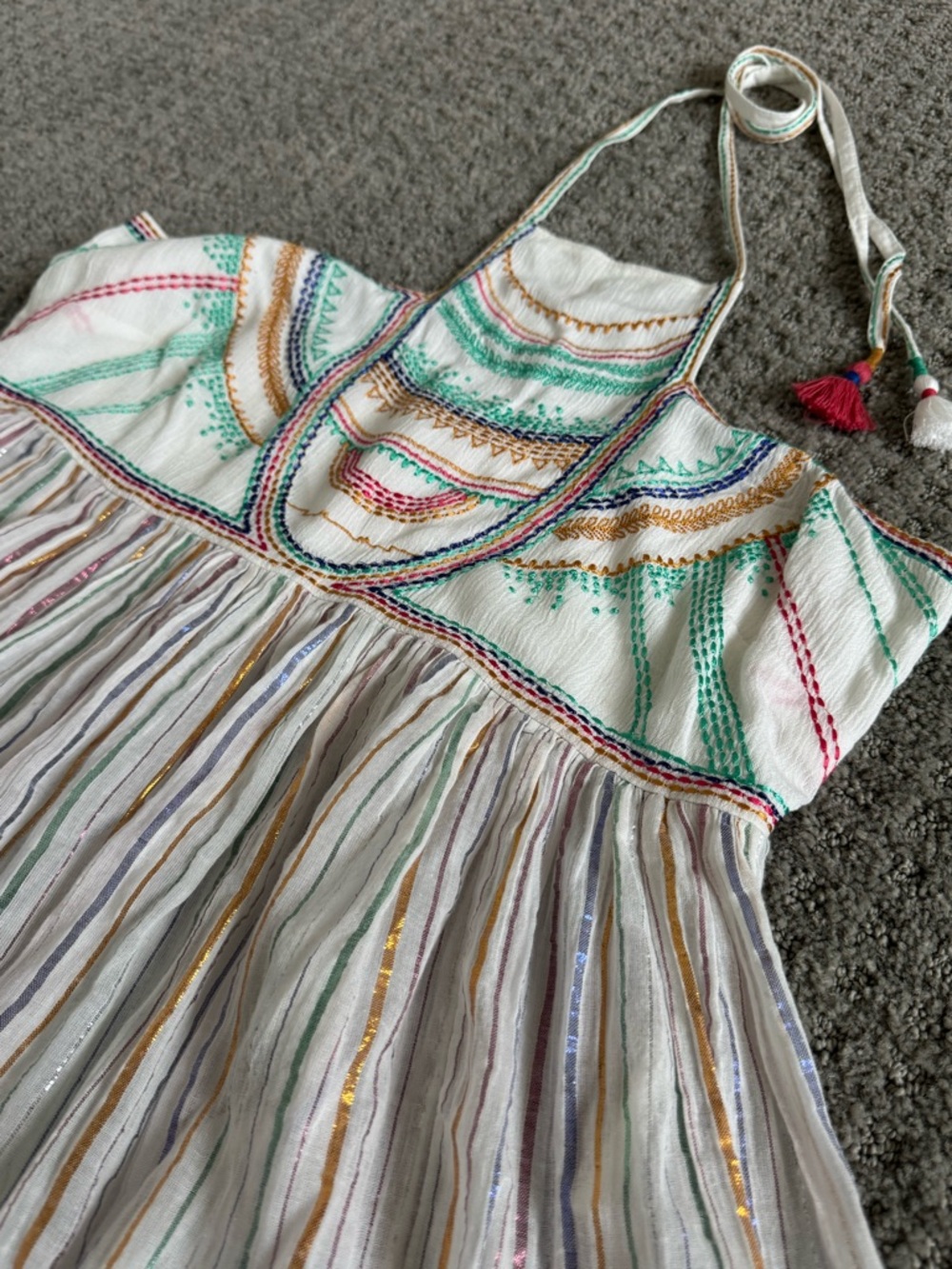 Anthro festive multicolored halter top with high neck and tassel tie-back. Sz 8